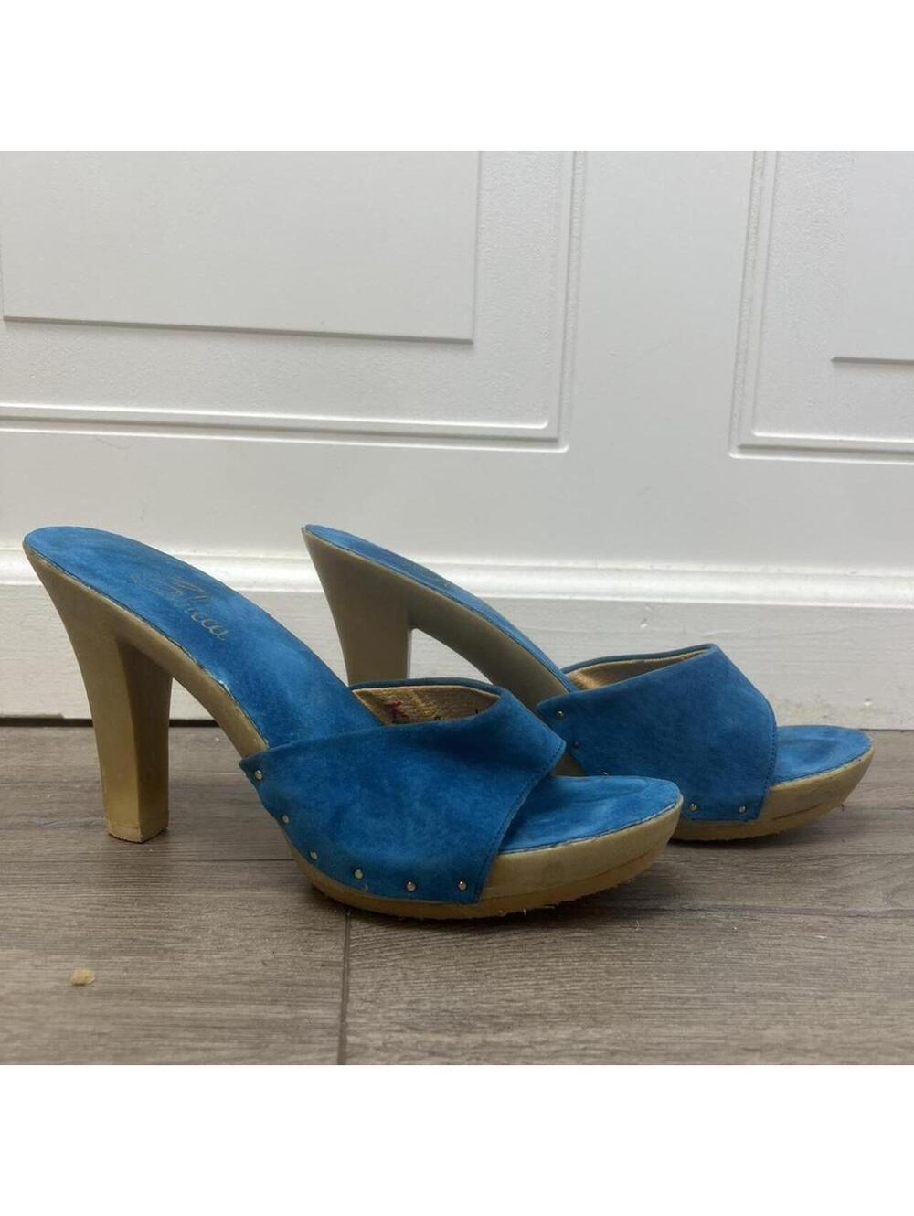 vintage Sbicca vibrant aqua colored suede mule platform sandals circa 1970.